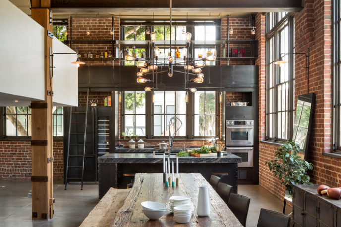 Post_industrial chandelier dining room industrial with brick walls clocktower building clocktower loft contemporary converted warehouse industrial large windows.jpg