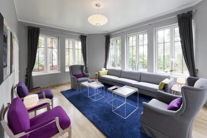 Post_livingroom furniture living room interior color decorating ideas with grey sofa and blue carpet also two purple chairs and simple white coffee table plus charming wooden floor and white windows wi.jpg