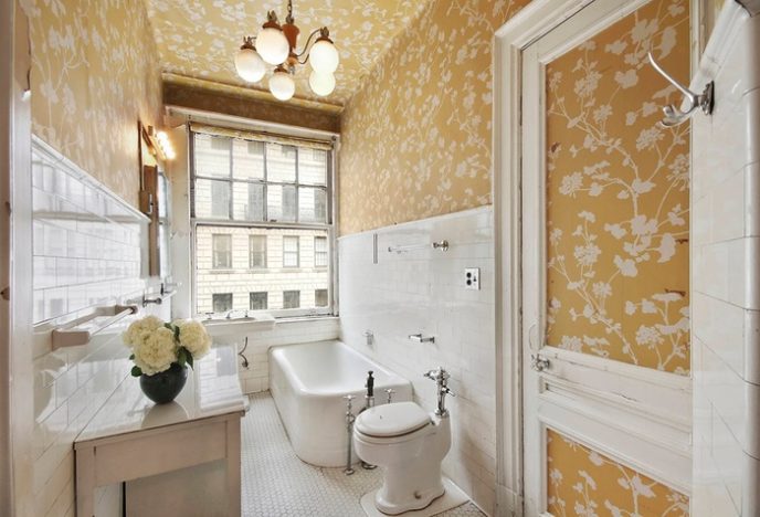 Post_traditional full bathroom with wallpaper and penny tile i_g isdovg59tjcbxu1000000000 zv4si.jpg