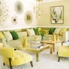 Post_trendy blend of green and yellow living room design with natural wall and gold sunburst mirrors and soft green sofa with yellow green pillow combined green wall color.jpg