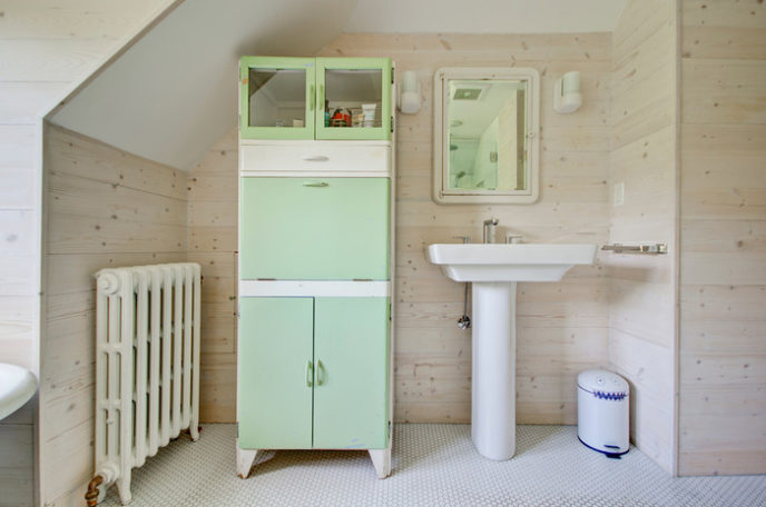 Post_bathroom cabinet vintage with farmhouse wood panel wall.jpg