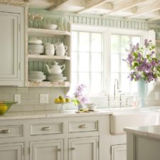 Post_cottage kitchen with marble countertops ceiling beams and glass backsplash i_g ishziliipnrcab0000000000 p52jv.jpg