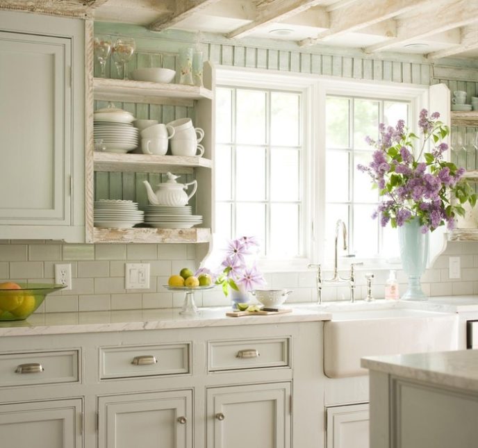 Post_cottage kitchen with marble countertops ceiling beams and glass backsplash i_g ishziliipnrcab0000000000 p52jv.jpg