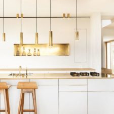 Post_minimalist scandinavian kitchen with golden accents also gold hanging lighting fixtures wood stools white modern small kitchen scandinavian interior design ideas.jpg