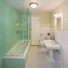 Post_mint tile shower in a wallpapered bathroom.jpg