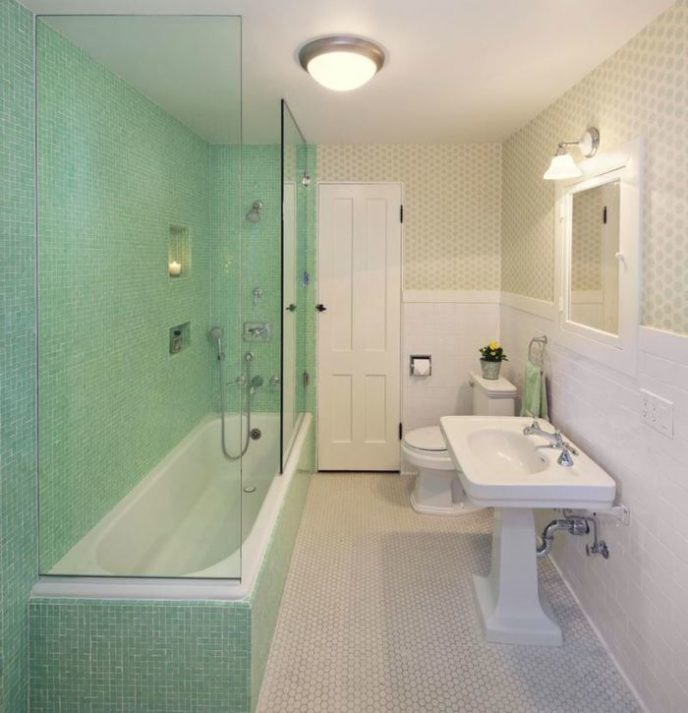 Post_mint tile shower in a wallpapered bathroom.jpg