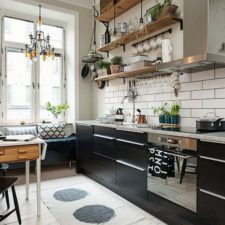 Post_small and stylish scandinavian kitchen with breakfast nook and floating wooden shelves.jpg