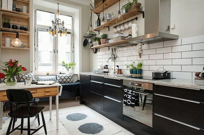 Post_small and stylish scandinavian kitchen with breakfast nook and floating wooden shelves.jpg