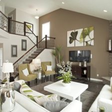 Post_contemporary living room with accent wall stone fireplace and banister i_g is sbpi86yzf78d h_vee.jpg