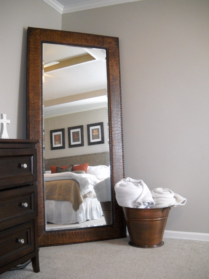Post_leaner mirror with brown wooden frame on wheat floor matched with wheat wall plus wooden dresser ad white bedding for bedroom decor ideas restoration hardware floor mirror large floor mirrors leaning 680x.jpg