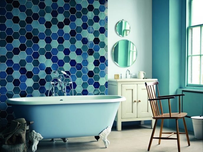 Post_post_interior bathroom furniture cute blue fiberglass stand alone clawfoot tub and blue hexagon glass mosaic tiled wall panel also white wooden bath vanity plus antique brown wooden armchair with shower r.jpg