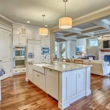 Post_traditional kitchen with built in bookshelf stone fireplace and crown molding i_g ispltec9uh0hxs1000000000 91vep.jpg