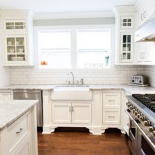 Post_traditional kitchen with sunroom and shaker style cabinets i_g istc5tx7g4t5zw0000000000 ebxtc.jpg