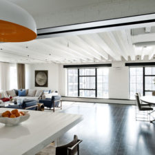 Post_an exposed white brick wall for kitchen hallway with hardwood flooring and amazing white pendant lamp.jpg