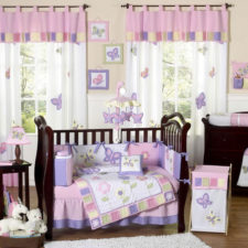 Post_bedroom kids room marvelous bedroom baby girl room with black wooden crib using flower and butterfly themed bedding set also white fur rugs above wood floor as well as black wooden cabinet drawer nea.jpg