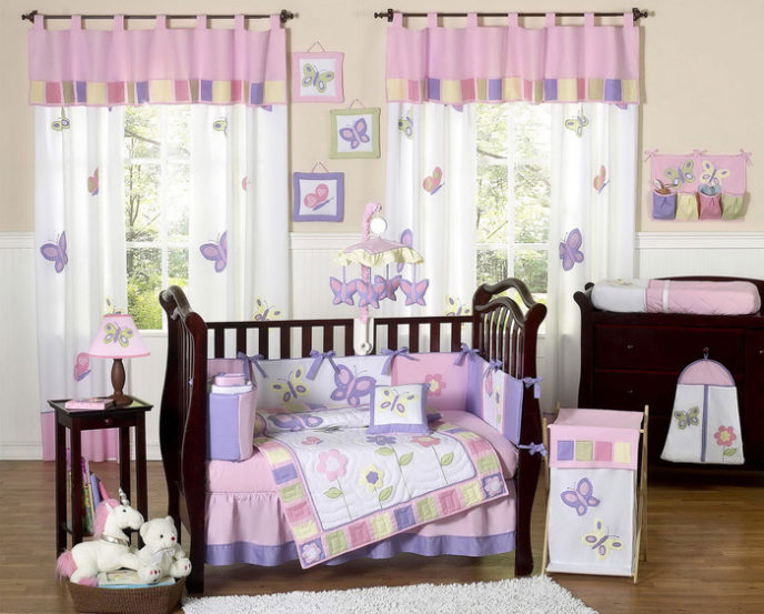 Post_bedroom kids room marvelous bedroom baby girl room with black wooden crib using flower and butterfly themed bedding set also white fur rugs above wood floor as well as black wooden cabinet drawer nea.jpg