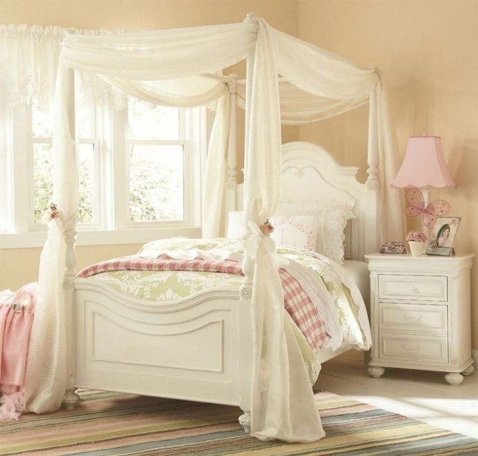 Post_cream wall color with classic white bed frame for elegant princess bedroom ideas with pink table lamp.jpg