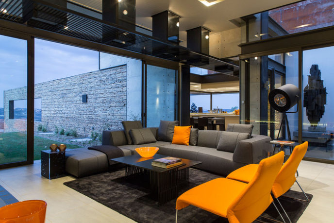 Post_impressive grey nuance house paint colours in south africa with orange seat applied on the black rug on the white modern ceramics floor with wooden coffee table.jpg