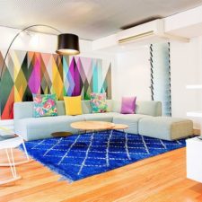 Post_brilliant living room with creative use of colorful wallpaper and rug 1.jpg