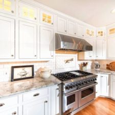 Post_traditional kitchen with white granite countertop herringbone tile and subway tile i_g isly0qyhzgafyn0000000000 wzlae.jpg