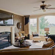 Post_traditional living room with wallpaper fireplace and crown molding i_g istg8qoucl7m6x1000000000 rf8ds.jpg