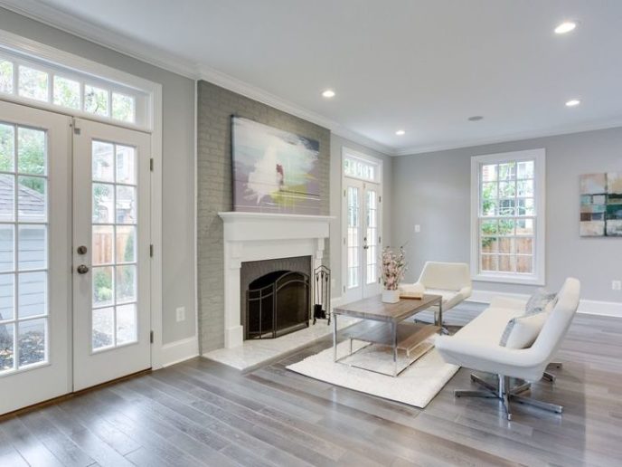 Post_transitional living room with crown molding tile flooring and fireplace i_g is9luiamnxzrn40000000000 xjkh9.jpg