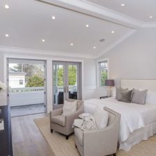 Post_transitional master bedroom with cathedral ceiling crown molding and wainscoting i_g isdc225gm9knx20000000000 gxdcq.jpg