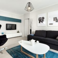 Post_apartment simply scandinavian style of living room in apartment in polanie ekolan designed by dragon art with wall mounted tv and white bench table and black suede lounge chair and fabric sofa also w 1024.jpg