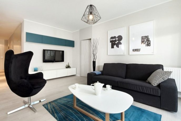 Post_apartment simply scandinavian style of living room in apartment in polanie ekolan designed by dragon art with wall mounted tv and white bench table and black suede lounge chair and fabric sofa also w 1024.jpg