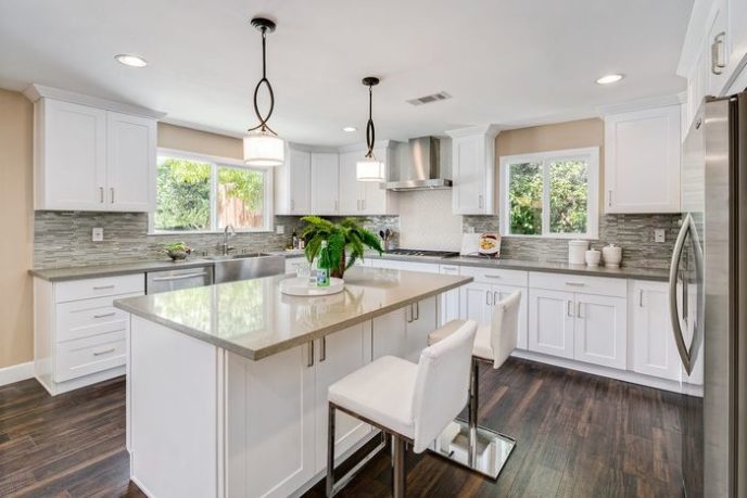 Post_contemporary kitchen with shaker style cabinets breakfast bar and pendant lights i_g isx3x7ac66aqig0000000000 uhlcf.jpg