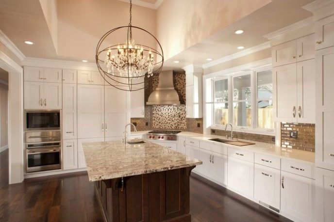 Post_contemporary kitchen with white cabinets subway tile backsplash and shaker style cabinets i_g is99x093suv0o51000000000 tiomm.jpg