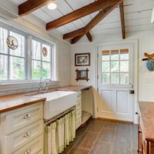 Post_country kitchen with exposed beams white cabinets and dutch door i_g istkn0mopt2z110000000000 xjzzx.jpg