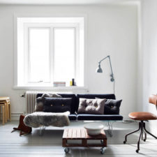 Post_interesting scandinavian living room model feat bright interior theme nuance also astounding black leather sofa design and engaging curved floor lamp plus cool brown wheeled chair and simple wheeled c.jpg