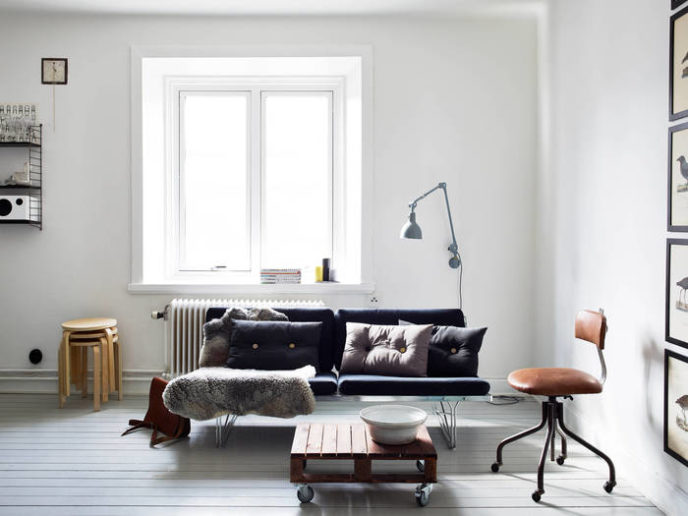 Post_interesting scandinavian living room model feat bright interior theme nuance also astounding black leather sofa design and engaging curved floor lamp plus cool brown wheeled chair and simple wheeled c.jpg