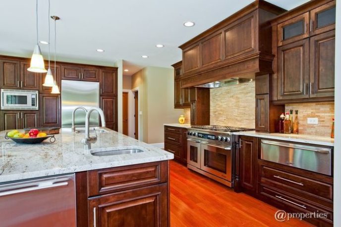 Post_traditional kitchen with hardwood flooring and subway tile i_g is 8c2eiyd8e1y5 nkv12.jpg