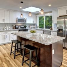 Post_transitional kitchen with glass subway tile breakfast bar and laminate flooring i_g islutt5z36zuwk1000000000 cuq1w.jpg