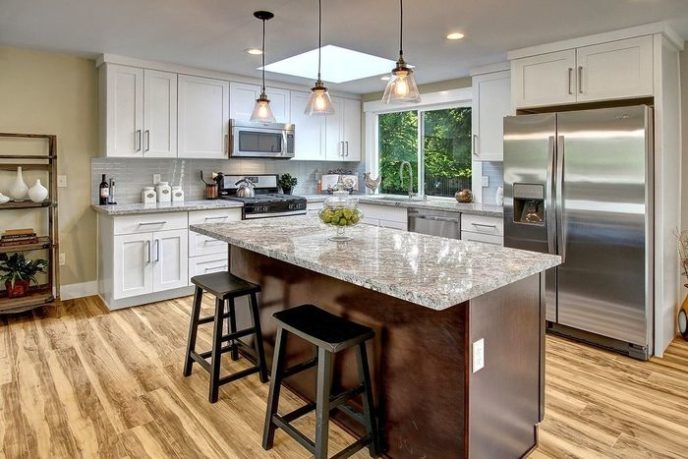 Post_transitional kitchen with glass subway tile breakfast bar and laminate flooring i_g islutt5z36zuwk1000000000 cuq1w.jpg