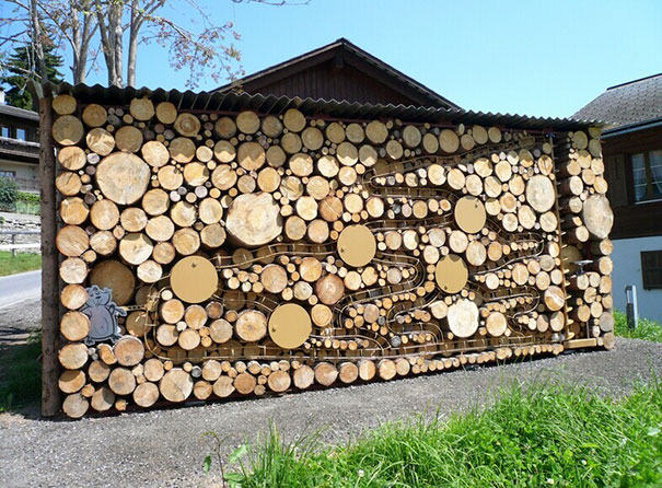 Creative wood pile stacking art 29 58186362727cf__605.jpg