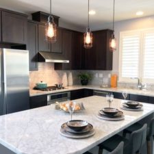 Post_contemporary kitchen with carrara marble breakfast bar and stone backsplash i_g isl6f2siawy6e00000000000 uny_z.jpg