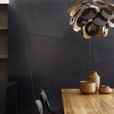 Post_design of the dining room pendant mimics that of a flower.jpg