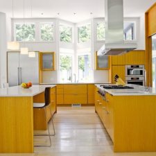 Post_gorgeous use of wood adds textural contrast and warmth to the ontemporary kitchen.jpg