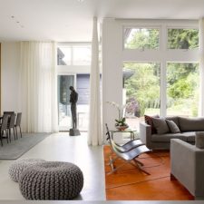 Post_interior with white sheer curtains and decor in gray.jpg