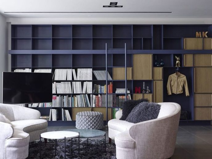 Post_large floor to ceiling open bookshelf in the living room.jpg