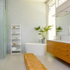 Post_lavish contemporary bathroom with a standalone tub and a unique wooden seat.jpg