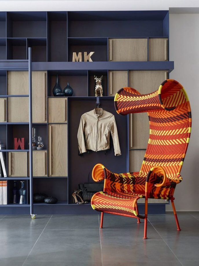 Post_open bookshelves and bright chair give the living room of taipei home a distinct charm.jpg