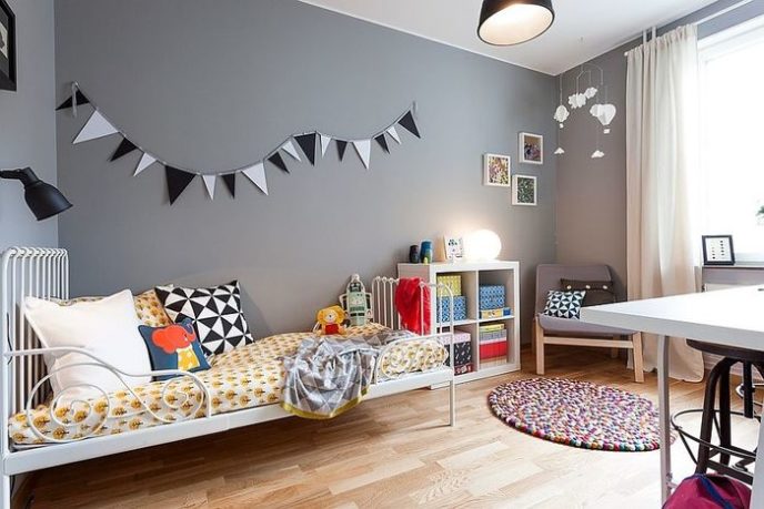 Post_scandinavian style kids room with an unassuming gray backdrop.jpg