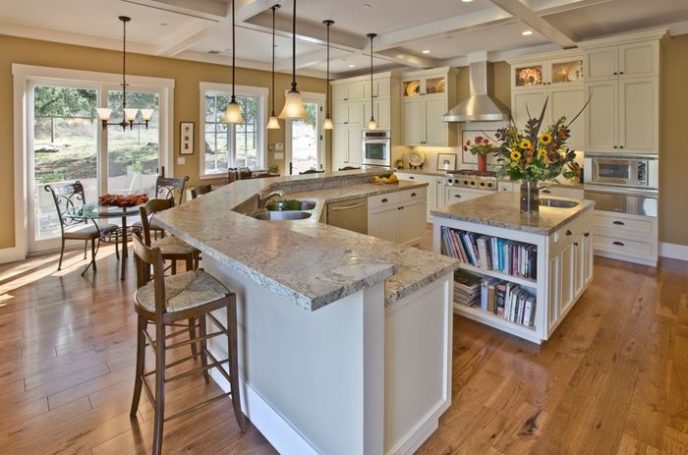 Post_traditional kitchen with breakfast bar pendant lights and granite countertops i_g ist47pdoktr50f0000000000 2bbw4 1.jpg