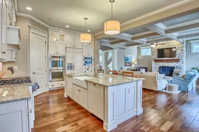 Post_traditional kitchen with built in bookshelf stone fireplace and crown molding i_g ispltec9uh0hxs1000000000 91vep.jpg