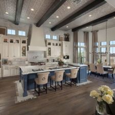 Post_traditional kitchen with hardwood flooring breakfast bar and stone backsplash i_g isd0hti4i2rtql0000000000 9ulyi.jpg