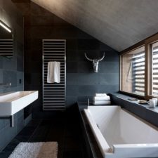 Post_ample natural light gives the dark bathroom a more airy vibe 1.jpg